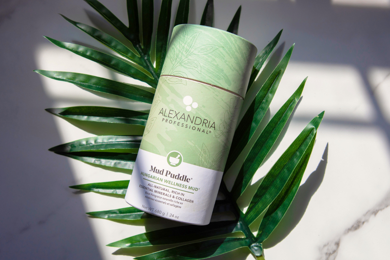 24 ounce Mud Puddle cylinder laying on green leaves